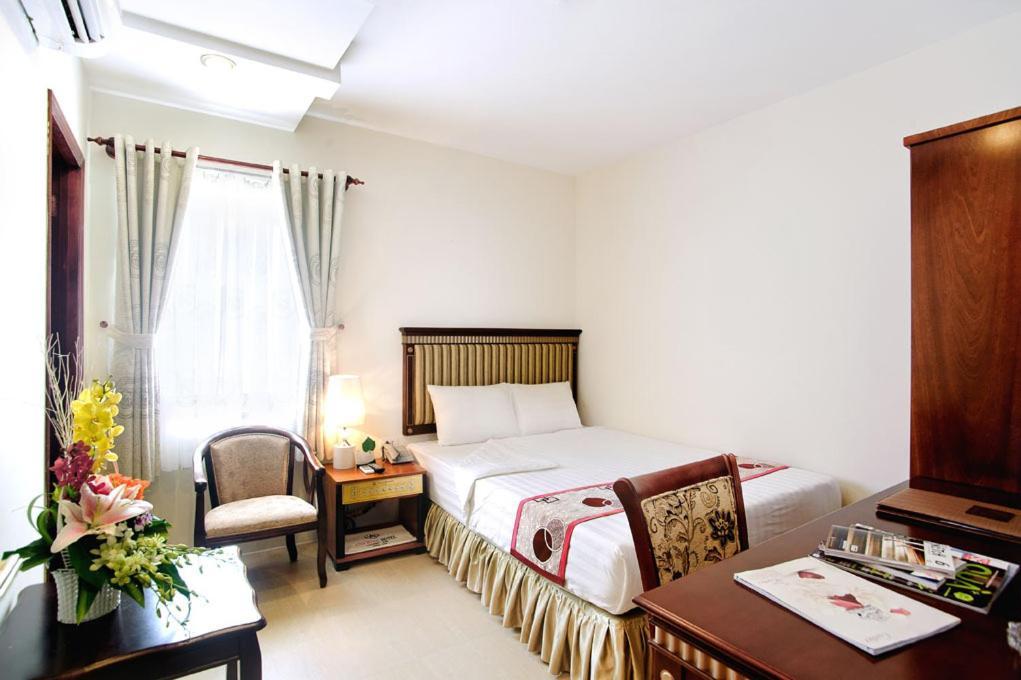 Anh Minh Hotel Ho Chi Minh-stad Kamer foto